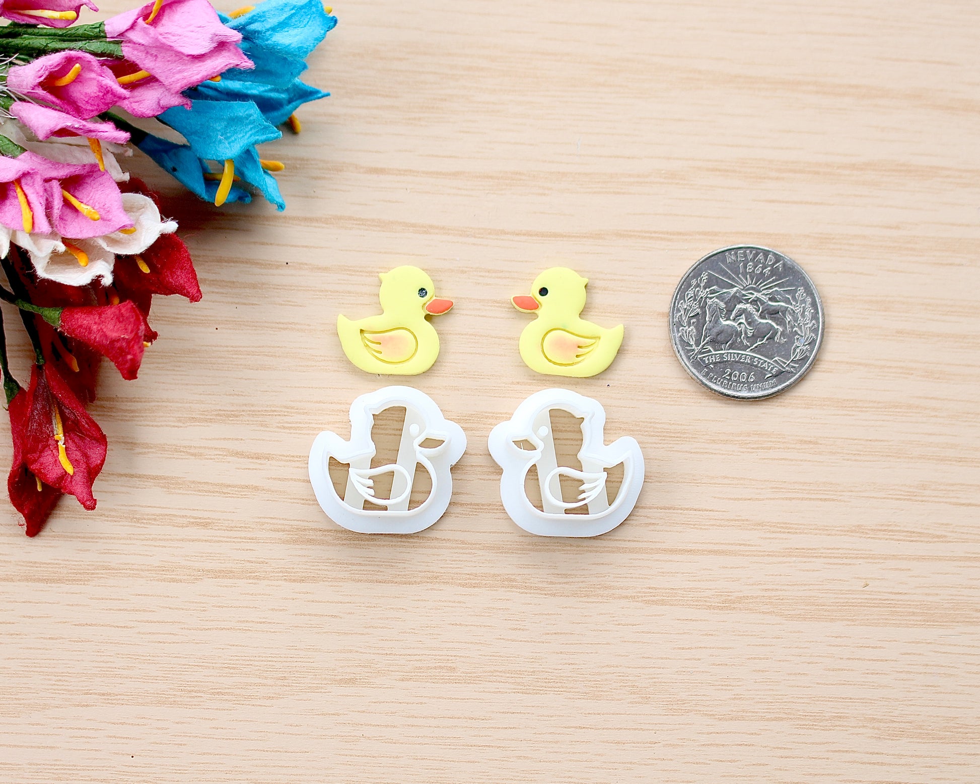Duckling shaped polymer clay cutter for crafting jewelry, charms, and decorations. 