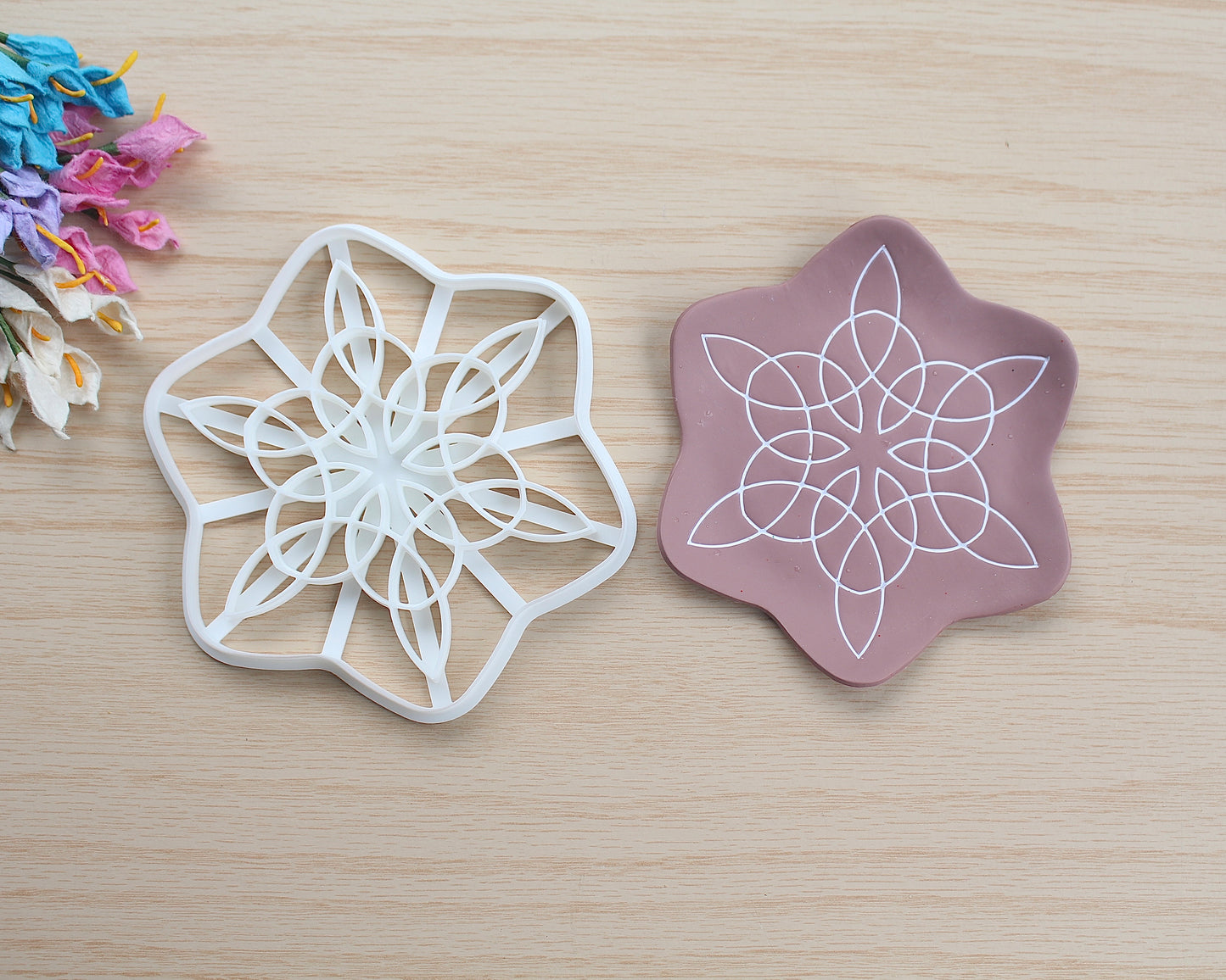 Celtic Snowflake Trinket Dish Polymer Clay Cutter with detailed snowflake and Celtic knot design, used for making polymer clay trinket dishes.