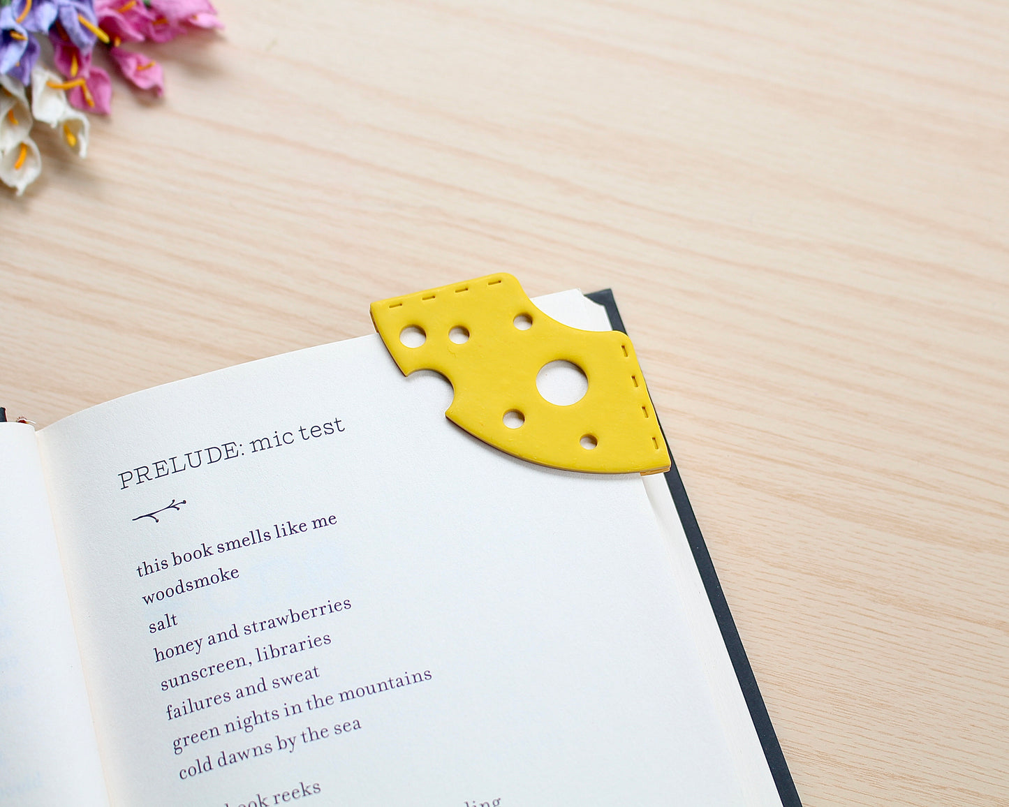 Swiss Cheese Corner Bookmark Polymer Clay Cutter shaped like a slice of cheese with holes, designed for making polymer clay bookmarks