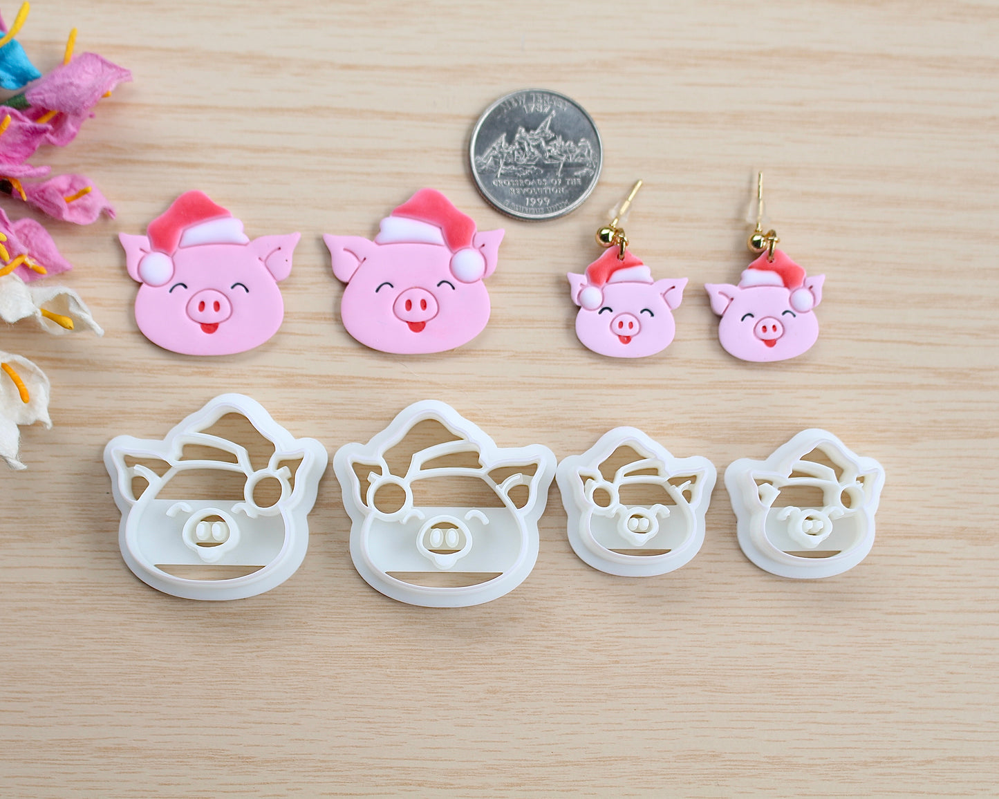 Christmas Piggy Polymer Clay Cutter shaped like a pig wearing a Santa hat, designed for making polymer clay ornaments and crafts