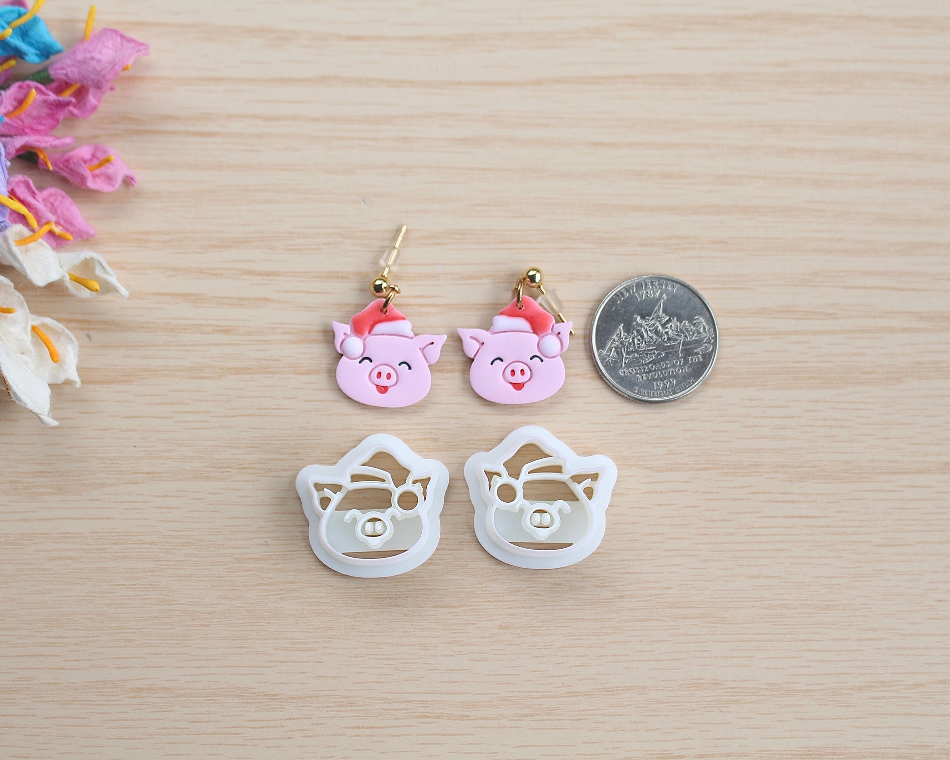 Christmas Piggy Polymer Clay Cutter shaped like a pig wearing a Santa hat, designed for making polymer clay ornaments and crafts