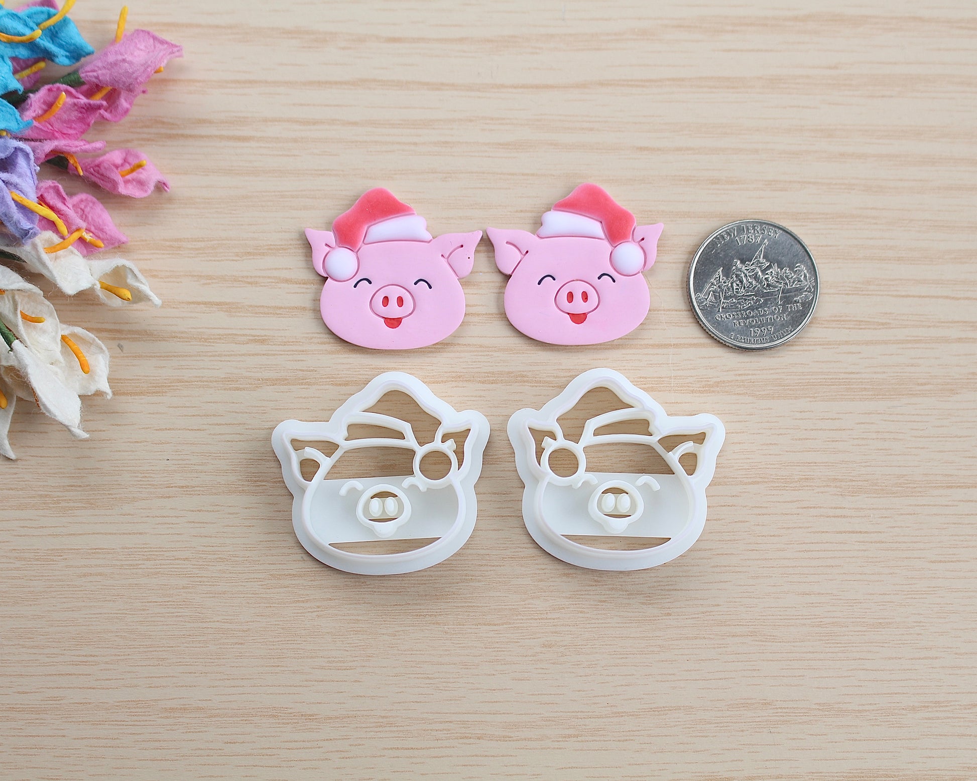 Christmas Piggy Polymer Clay Cutter shaped like a pig wearing a Santa hat, designed for making polymer clay ornaments and crafts