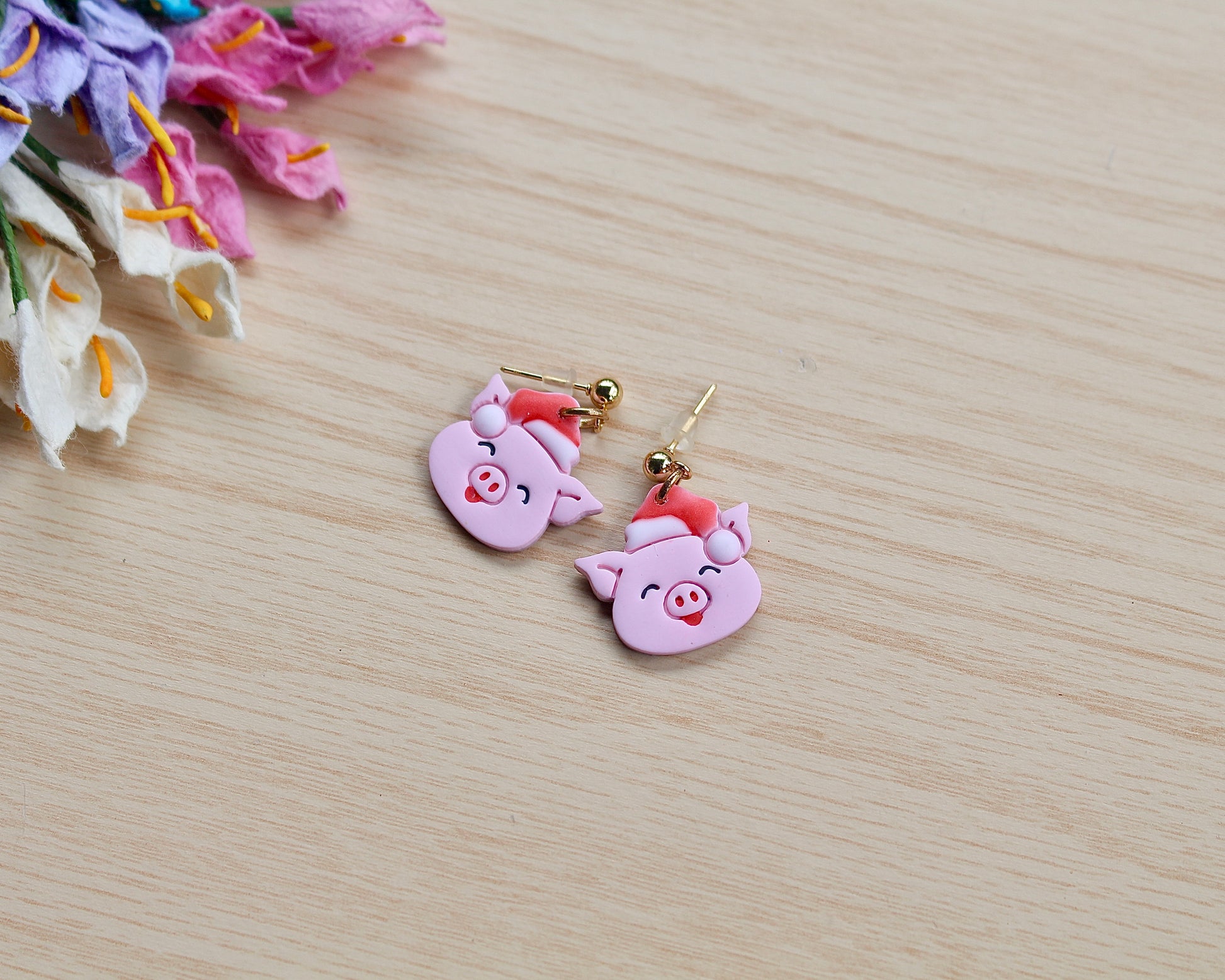 Christmas Piggy Polymer Clay Cutter shaped like a pig wearing a Santa hat, designed for making polymer clay ornaments and crafts