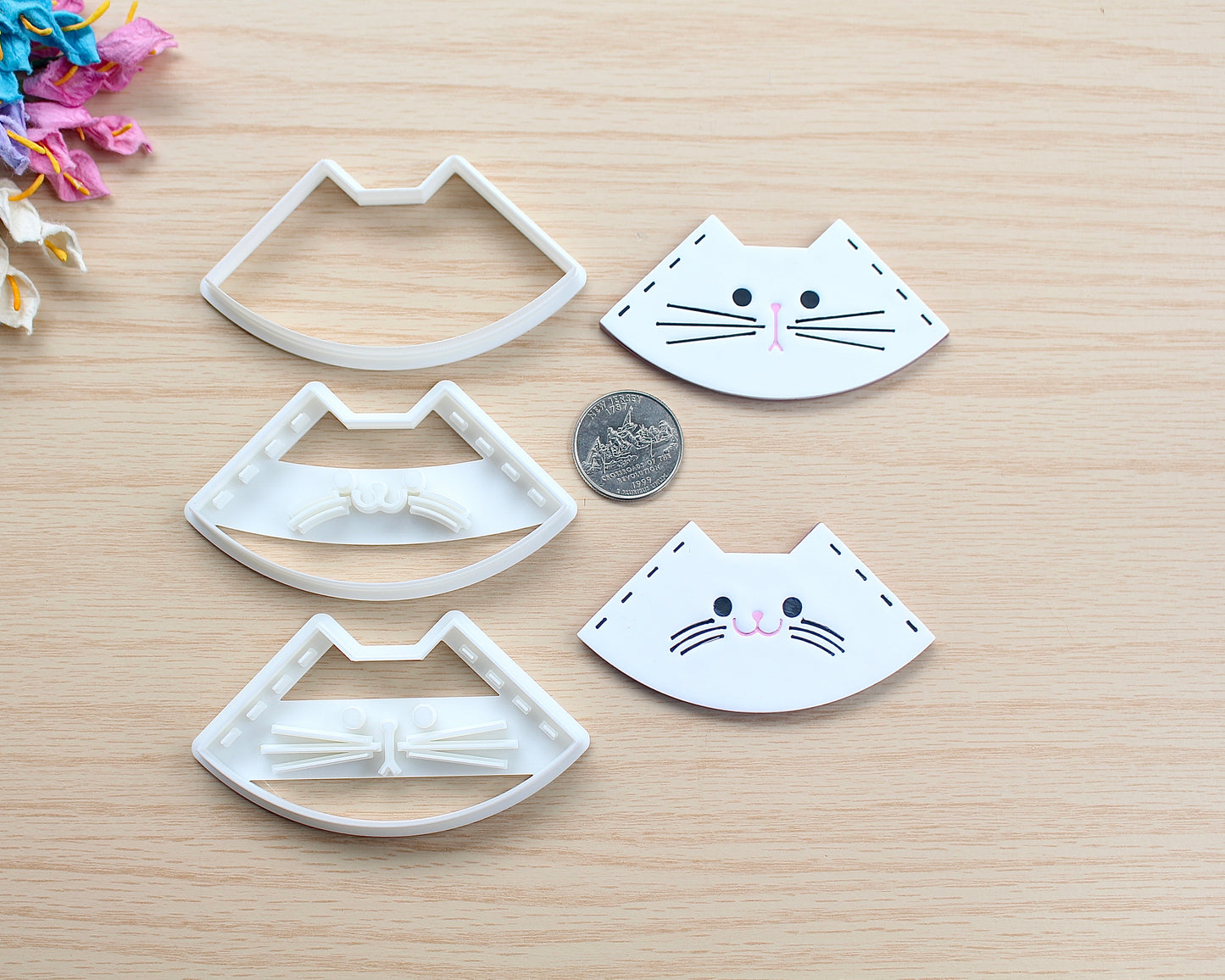 Kitty Corner Bookmark Polymer Clay Cutter in the shape of a cat’s face, designed for making polymer clay bookmarks.
